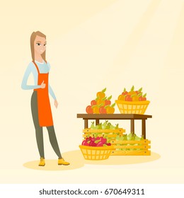 Young caucasian seller giving thumb up while standing on the background of shelves with vegetables and fruits. Seller selling fruits and vegetables. Vector flat design illustration. Square layout.