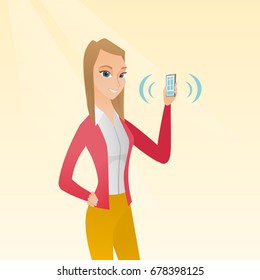 Young caucasian smiling woman holding ringing mobile phone. Happy woman answering a phone call. Woman showing a ringing phone in hand. Vector cartoon illustration. Square layout.