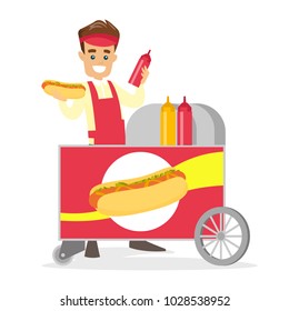 Young caucasian white street seller dressed in an apron standing with hot dog cart. Small business and street food concept. Vector cartoon illustration isolated on white background. Square layout.