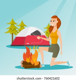 Young caucasian white woman with a wooden stick in his hand sitting near the campfire and enjoying the atmosphere. Smiling woman making the campfire. Vector cartoon illustration. Square layout.