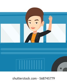 Young caucasian woman enjoying her trip by bus. Passenger waving hand from bus window. Woman peeking out of bus window and waving hand. Vector flat design illustration isolated on white background.
