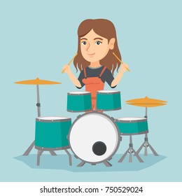 Young caucasian woman playing the drums. Mucisian playing the drums. Smiling woman playing the drum kit. Happy woman sitting behind the drum kit. Vector cartoon illustration. Square layout.