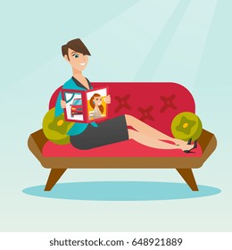 Young caucasian woman reading a magazine. Happy woman sitting on the couch and reading a magazine. Woman sitting on the couch with a magazine in hands. Vector flat design illustration. Square layout.