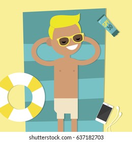 Young character lying on the beach. Top view / flat editable vector illustration, clip art