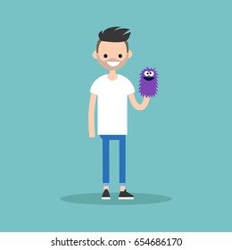 Young character playing with a hand puppet / flat editable vector illustration, clip art