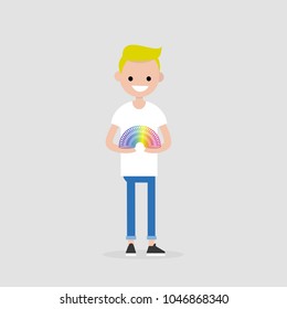 Young character playing with a rainbow spring toy / flat editable vector illustration, clip art