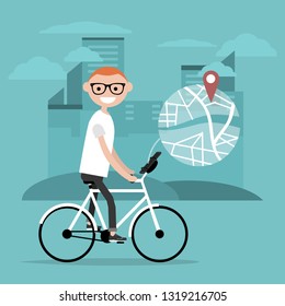 Young character riding a bike and using a navigational app. Map and geo tag on city background.Flat cartoon design.Clip art