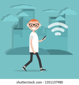 Young character walking down the street with wireless headphones.Wireless icon.Flat cartoon design