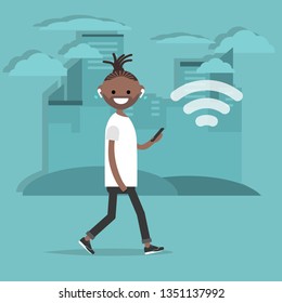 Young character walking down the street with wireless headphones.Wireless icon.Flat cartoon design