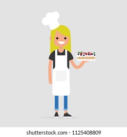 Young cheerful chief holding a berry cake. Flat editable vector illustration, clip art