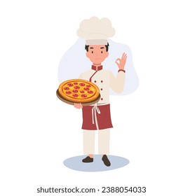 Young Chef Showing OK Sign. Happy Chef Doing OK Hand Sign and holding homemade pizza on tray in other hand