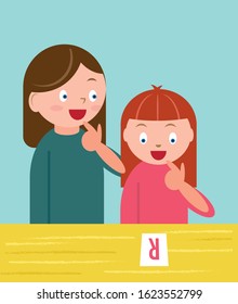 Young child having session with speech therapist