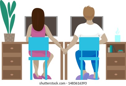 Young couple is always working together at a computer in the home office and holding hands.