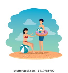 young couple with balloon and float on the beach