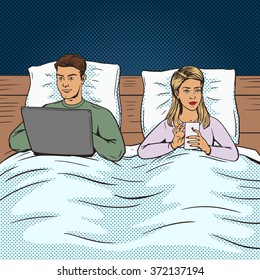 Young couple in bed with laptop and phone pop art style vector illustration. Comic book style imitation. Gadgets in bed. Married couple