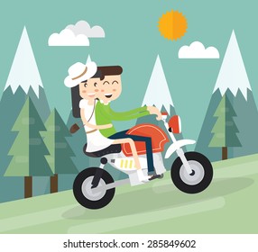 Young couple bikers riding on the mountain