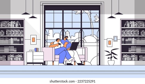 young couple with credit card using laptop online shopping concept man woman ordering goods together living room interior
