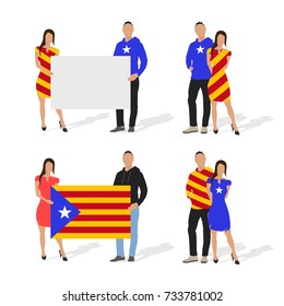 A Young Couple Dressed in the Colors of the Flag of Catalonia. People are Holding the Flag of Catalonia and Blank Sign.