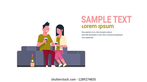 young couple drinking wine man woman lovers sitting on couch happy valentines day holiday celebration concept flat horizontal isolated copy space