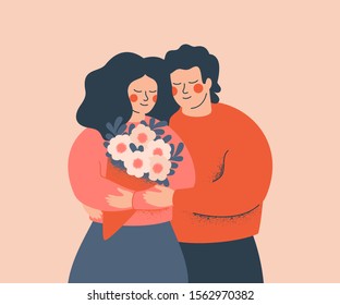 Young couple embrace each other with love and care. Happy woman holds a flower bouquet. Concept of the Valentine day and family day