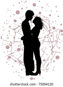 A young couple embrace and look at each other