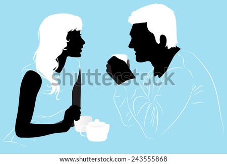 Young couple enjoys a hot tea in the cafe, silhouettes