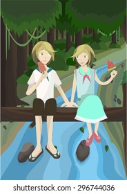 young couple in the forest are relax on the log over the stream