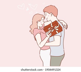 Young couple with gift box hugging at home. In love couple concept. Hand drawn in thin line style, vector illustrations. 