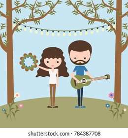 Young couple of happy musicians. Longhaired girl with tambourine and bearded boy with guitar. Festival symbol