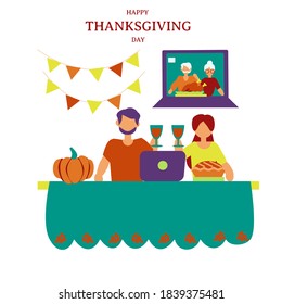 Young couple have Thanksgiving dinner online whith  old relatives. Thanksgiving online party