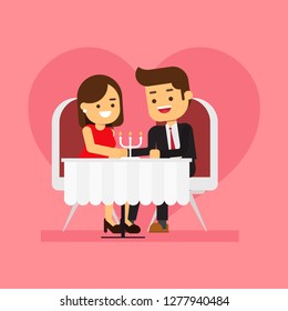 Young couple having dinner in a restaurant. Valentine's day concept
