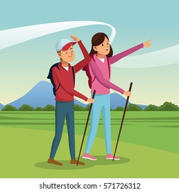 young couple hiking with backpack walking sticks landscape