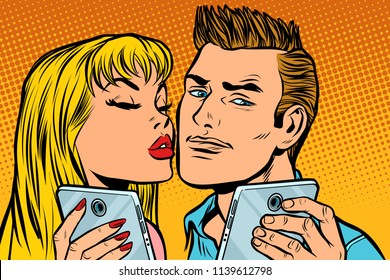 young couple kiss selfie on smartphone. Pop art retro vector illustration kitsch vintage drawing