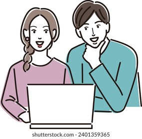 Joven pareja mirando la laptop y hablando