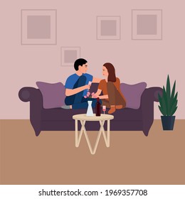 Young couple in love having dinner at home