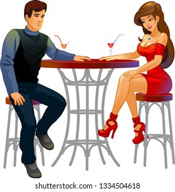 Young couple in love at a table in a cafe