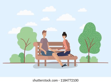 young couple lovers sitting on park chair