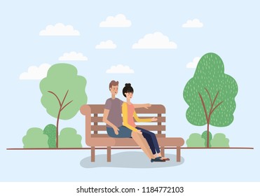 young couple lovers sitting on park chair