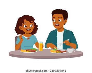 young couple man and woman eat meat steak together