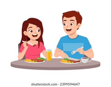 young couple man and woman eat meat steak together