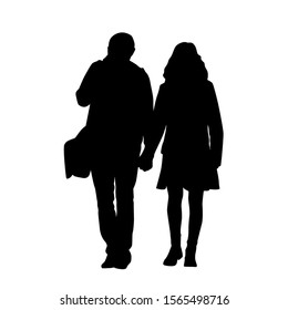 Young couple, man and woman walking and holding hands, isolated vector silhouette. Front view