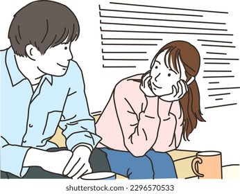 A young couple of men and women looking at each other while sitting on the sofa
