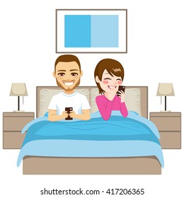 Young couple on bed using smartphone in addiction concept