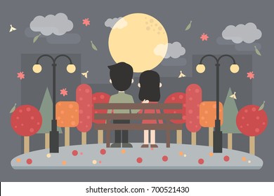 Young couple on bench.