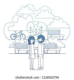 young couple in the park with bicycle