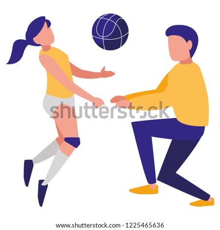young couple playing volleyball