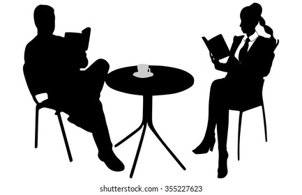 young couple reading a book during coffee break 