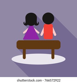young couple sit on the bench