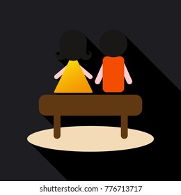 young couple sit on the bench