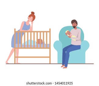 young couple sitting on sofa with newborn baby